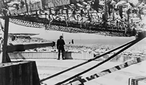 English Channel Prints: German soldiers guarding camouflage covered gun batteries on the Atlantic Wall