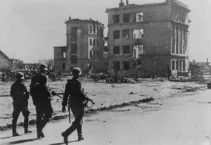 Stalingrad Prints: Three German soldiers walking in desolate street in the ruins of Stalingrad in Sept