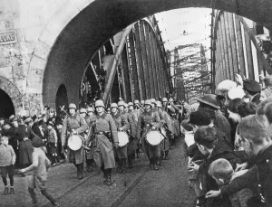 Germany Prints: German troops march across the Hohenzollern Bridge to re-occupy Cologne and the Rhineland