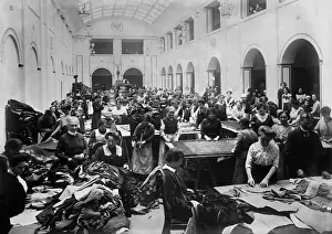 Sewing Prints: German women making soldiers uniforms during world War 1. 1914-18. (BSLOC_2012_4_57)