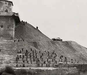 Lcgr1409 Prints: German workers covering a massive anti-aircraft bunker built in Berlin during World War 2