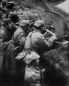 Machine Guns Prints: German WW1 machine gun crew firing from a trench on the Eastern Front