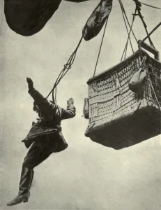 Parachutes Prints: German WW1 observer jumping from burning balloon harnessed to a parachute