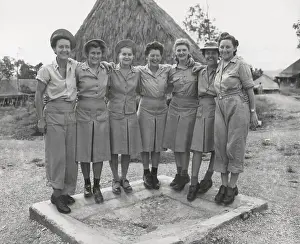 Nurses Prints: GI Little Abners shoes are modeled by nurses of a medical regiment in New Guinea