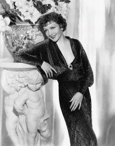 Travis Banton Prints: THE GILDED LILY, Claudette Colbert, in a gown by Travis Banton, 1935