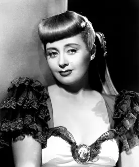 Ruffled Sleeves Prints: THREE GIRLS ABOUT TOWN, Joan Blondell, 1941
