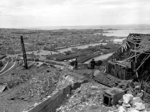 Docks Prints: Three GI's view the port city of Cherbourg after the capture of Fort du Roule