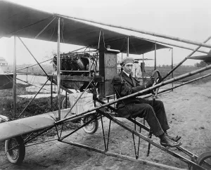Newspapers Prints: Glenn Martin (1886-1955), delivering newspapers in his airplane