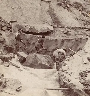 Extraction Prints: Three gold miners working a claim with picks and shovels