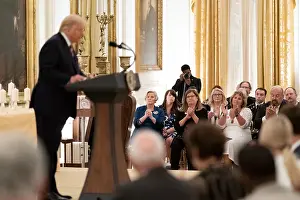 Casualties Prints: Gold Star families applaud President Donald Trump at a White House reception