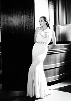 GRAND HOTEL, Joan Crawford, in a gown by Adrian, 1932