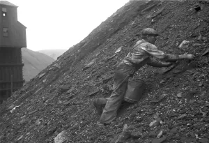 Economic Crisis Prints: During the Great Depression a man salvages good coal from slag heaps at Nanty Glo