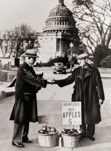 Business Cycles Prints: The Great Depression. Unemployed man sells apples near the Capitol in Washington D.C