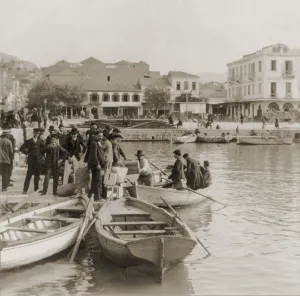 Luggage Prints: Greek immigrants, all men, embarking in small boat for asteamer that will take them to America