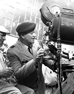 THE GREEN BERETS, co-director and star John Wayne, on-set, 1968