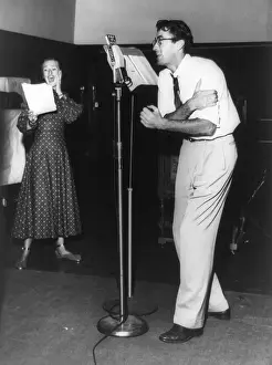Suspense Prints: Gregory Peck at microphone with Kay Brinker in a radio play