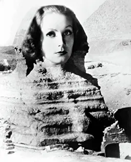 Jsx 24 Prints: Greta Garbo, in a 1931 portrait from INSPIRATION which Clarence Sinclair Bull transposed over the Sphinx
