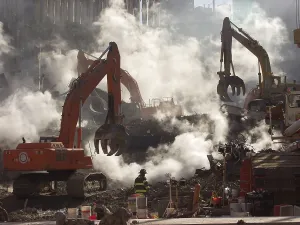 Skyscraper Prints: Ground Zero still smolders as recovery operations continue a month after the terrorist attack
