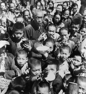 Famine Prints: Group of children and adults begging for food in the Hunan Province, China in 1946