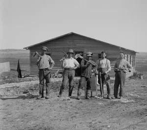 Palestine Prints: Group portrait of Jewish settlers on a kibbutz in Palestine. Ca. 1920-36