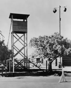 Deportation Prints: Guard tower and lights at Fresno, California, Assembly Center