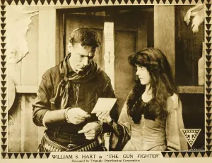 1917 Movies Prints: THE GUN FIGHTER, l-r: William S. Hart, Margery Wilson on lobbycard, 1917