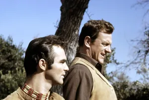 GUNSMOKE, from left, Burt Reynolds, James Arness, (1963), 1955-1975
