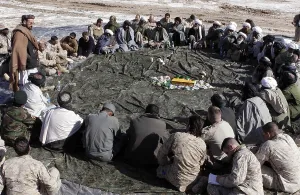 Candid Group Portrait Prints: Haji Zahir district governor of Marjeh presided over a shura where he listened to the needs of the Shorshorak village