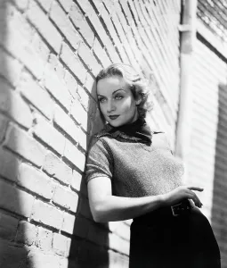 Brick Wall Prints: HANDS ACROSS THE TABLE, Carole Lombard, on the Paramount lot between takes, September 1935