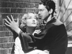 Images Dated 30th April 2013: HANDS ACROSS THE TABLE, from left: Carole Lombard, Fred MacMurray, 1935