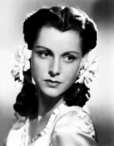 Flowers In Hair Prints: HAPPY LAND, Frances Dee, 1943, TM and copyright 20th Century Fox Film Corp