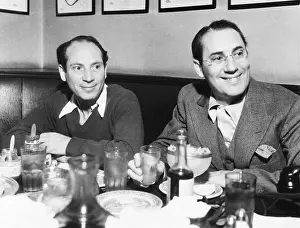 Hollywood Prints: Harpo (left) and Groucho Marx at lunch in the famous Brown Derby Restaurant in Hollywood
