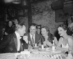 Movie Stars Prints: Harry Hopkins, Commerce Sec. out on the town with famous friends