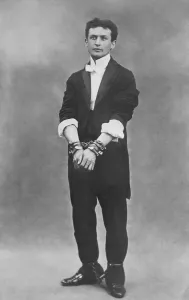 Chains Prints: Harry Houdini (1874-1926), in chains. 1903