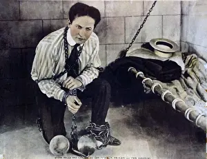 Movie Prints: Harry Houdini (1874-1926), in still from a movie he made with Famous Players-Lasky Corporation