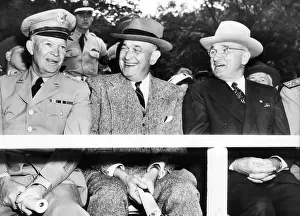Harry Truman observing the first Armed Forces Day. Reviewing the parade in Washington, L-R: General Dwight Eisenhower; Secy of Defense, Louis Johnson; and President Truman