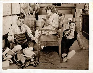 Foot Prints: THE HAYSEED, lobbycard, from left: Roscoe Fatty Arbuckle
