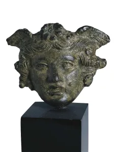Bronze Prints: Head of Medusa. Roman art. Sculpture on bronze
