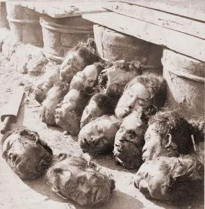 Executions Prints: Heads of Chinese criminals scattered on the ground after their execution at Canton prison