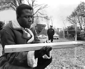 Coat Prints: IN THE HEAT OF THE NIGHT, Sidney Poitier, Rod Steiger (background), 1967