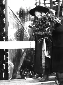 Keller Prints: Helen Keller, the blind and deaf writer, christens a ship during World War I