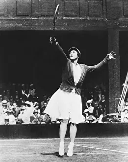 Swing Prints: Helen Wills Moody returning a high one during her match with Mrs