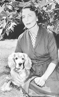 At Home Prints: Helen Wills Moody Roark and her dog Docky at her Los Angeles home in August 1958