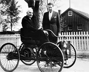 Vintage Car Prints: Henry Ford sits in his first Ford car built in 1896