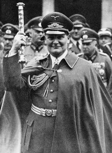 Goering Prints: Hermann Goering (1893-1946), holding up his Fieldmarshall's baton at Air Force day parade