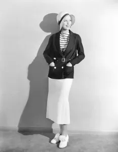 Double Breasted Jacket Prints: HEROES FOR SALE, Loretta Young in Navy blue double brested jacket and white flannel skirt