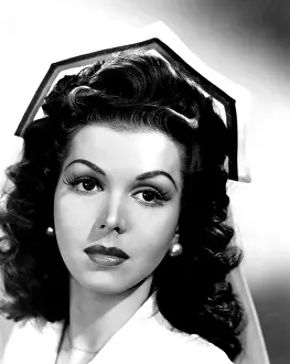 Pearl Earrings Prints: HEY, ROOKIE, Ann Miller, 1944