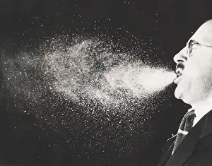 Business Suit Prints: High speed strobe photograph of a cloud of droplets stopped in full flight during a sneeze