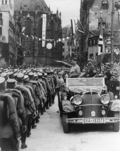 1405history Prints: Hitler giving Nazi salute to Storm Troopers passing by open his car