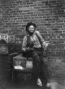 Brick Wall Prints: Hobo John Bour, a barefooted, shabbily dressed man